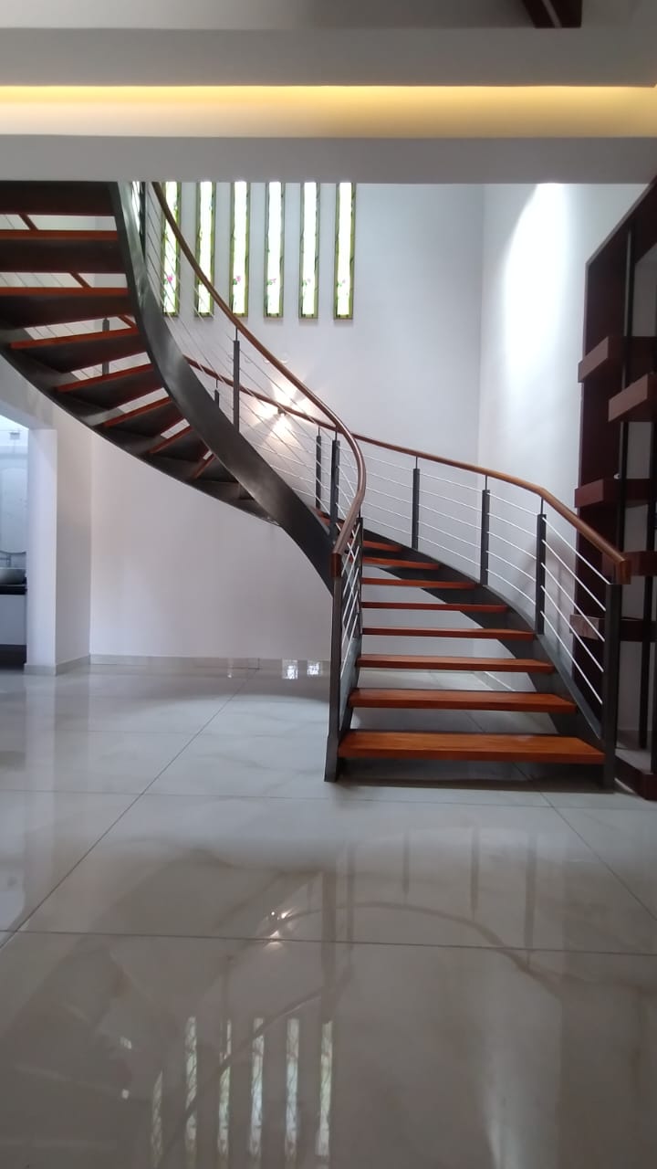 Terrace-installed Victorian spiral steel staircase in Erode, Tamil Nadu